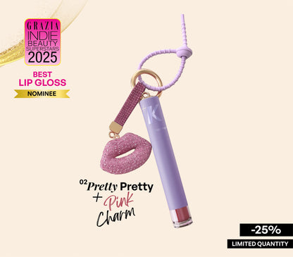Nitibha Kaul holding ALT+K Beauty Colour Intense Lip Gloss with glossy nude pink lips.